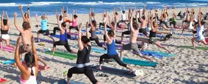 Beach yoga for adults and families
